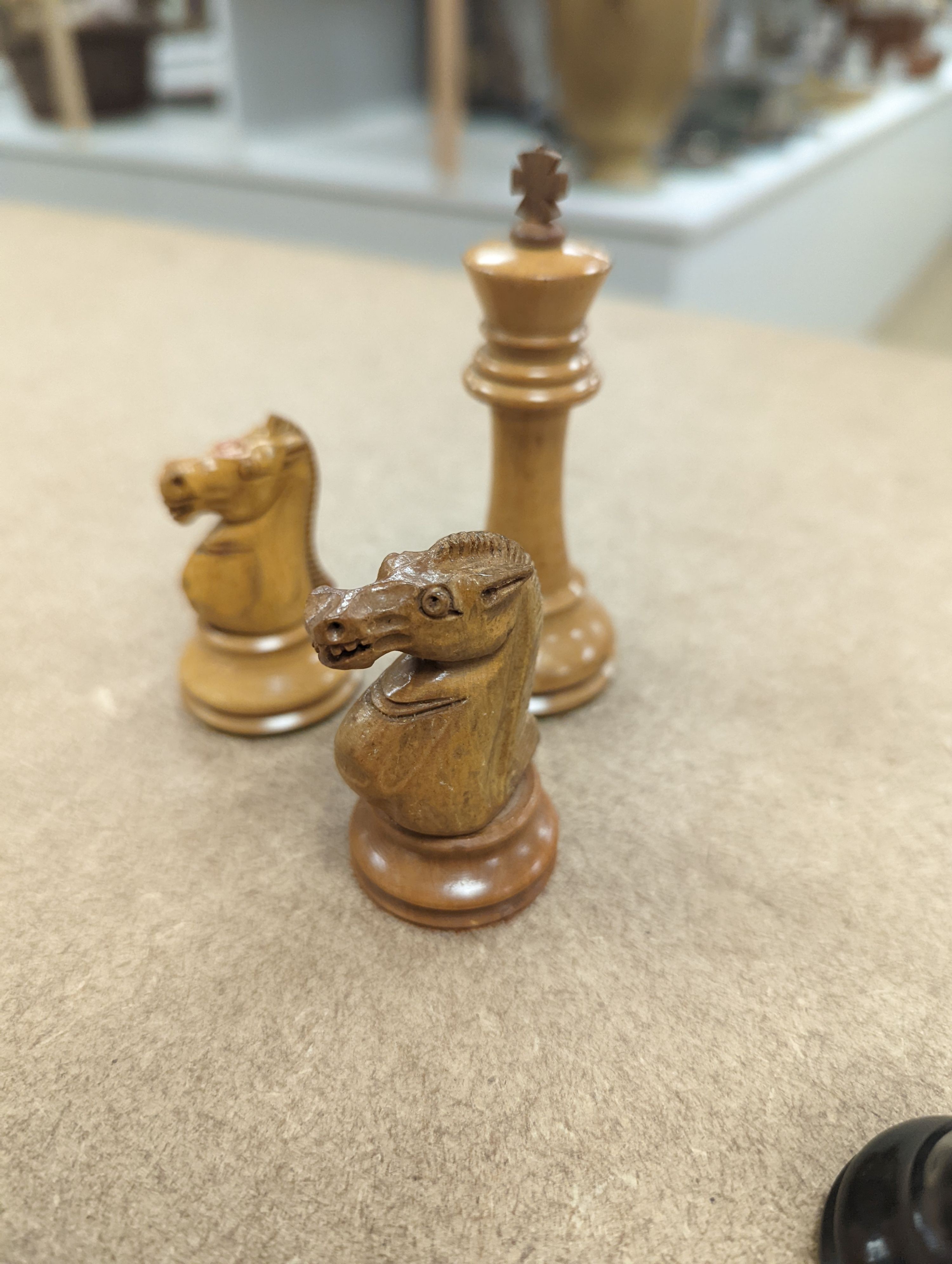 A Staunton chess set, some associate pieces and a miniature chess set. King height - 9cm